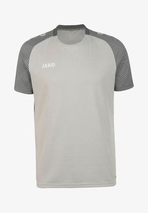 Lichtgrijze sport T-shirt met korte mouwen, voorzien van een gestructureerd donkergrijs patroon op de schouders en een witte JAKO-logo op de voorkant.