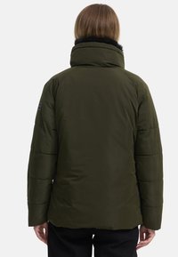 Olive green puffer jacket with a high collar and textured black fur trim. Features quilted pattern and elastic cuffs; smooth, water-resistant fabric.