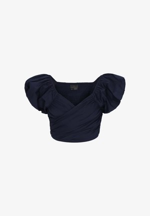 Blouse courte bleu marine avec manches courtes bouffantes et devant à effet drapé et noué.