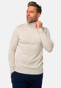 Hellgraues Rollkragensweatshirt aus weichem Strickstoff mit langen Ärmeln, taillierter Passform sowie gerippten Bündchen und Saum.
