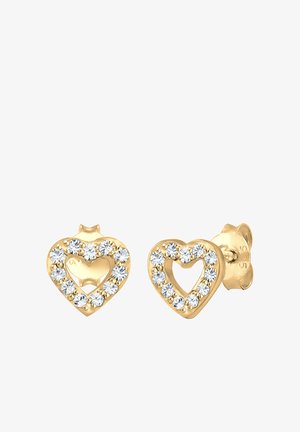 Guld hjerteformede øreringe prydet med klare rhinsten, som har et udskåret hjerte-design og små bagstøtter til sikring.