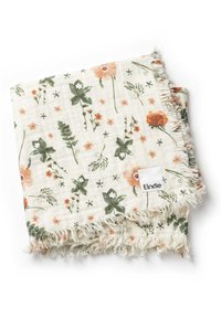 Cotton blanket with a floral pattern in green and coral on a cream background. Edges feature frayed detailing. Tag labeled "Elodie."