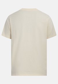 Camiseta de manga curta de cor creme com decote redondo, feita de algodão suave, com uma textura lisa e um design simples e minimalista.