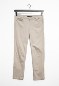 Beige cotton pants with a straight-cut design, featuring pockets and a button closure. Fabric has a smooth texture and minimal stitching details.