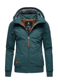 Turkis vandtæt jakke med brun imiteret pelsforing og hætte med snøre. Har lynlås foran, ribstrikkede ærmeafslutninger og sidelommer.