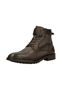 Bruine leren enkellaarsjes met een gestructureerd oppervlak, ronde neus, vetersluiting en contrasterende donkerbruine accenten op de bovenkant en zool.