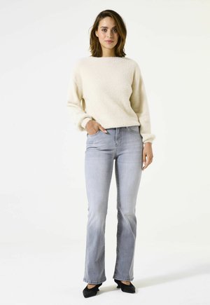 CELIA  - Flared Jeans - medium used