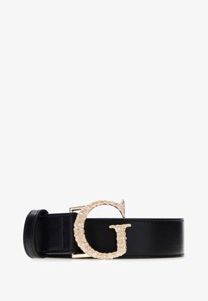 Cintura in pelle nera con fibbia a forma di "G" in oro tempestata di strass. La cintura ha una texture liscia e un design classico.