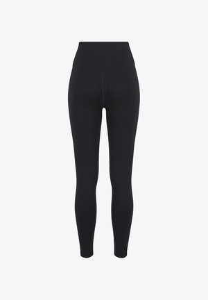 Leggings neri a coste a vita alta, mostrati da dietro, con design senza cuciture e taglio alla caviglia.