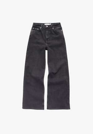 Schwarze weit geschnittene Jeans aus Denim; ausgestattet mit fünf Taschen, einer hohen Taille und dezenten Waschungen auf der Vorderseite.