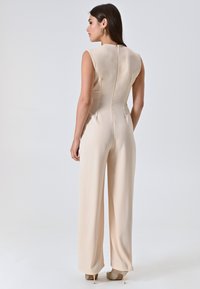 Rinascimento Jumpsuit - beige