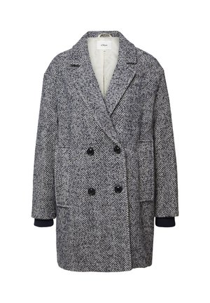 Dubbelzijdige herringbone jas in marineblauw en grijs, met grote zwarte knopen, zijzakken en contrasterende gebreide manchetten. Getextureerde wolmix stof.