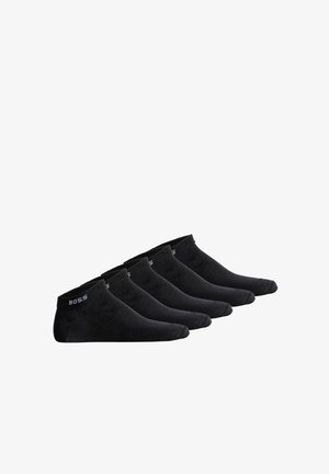 Schwarze Knöchelsocken aus weichem Material, mit einem gerippten Bündchen und einem dezenten Logo. Fünf Paar nebeneinander angeordnet.