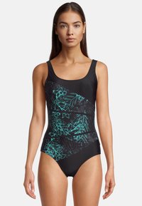 Maillot de bain noir avec des motifs botaniques teal, présentant un décolleté arrondi et des bretelles réglables. Tissu lisse et extensible pour le confort.