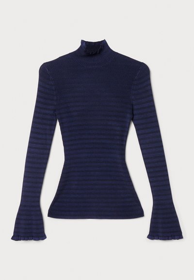 Navy striped turtleneck top made from ribbed fabric. Features long sleeves with flared, ruffled cuffs and a high neck design.