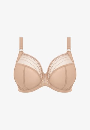 Alaston rintaliivit, joissa on muotoillut kupit ja läpikuultavia verkko-paneeleja. Varustettu pistekoristeilla ja säädettävillä olkaimilla. Pehmeä kangas, jossa on sileä pinta.