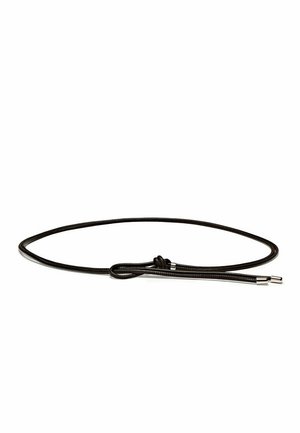 Thin black leather belt with a small knot and metal tips, laid flat on a white background.