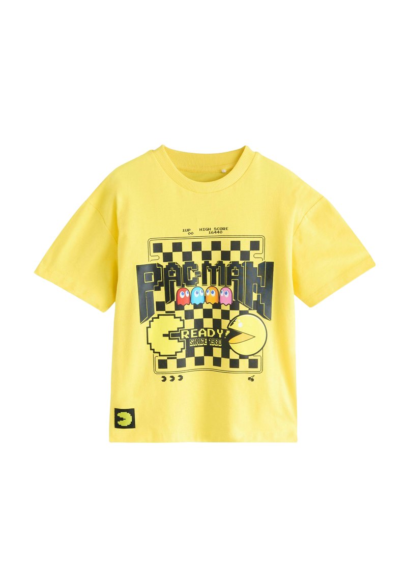 Gul bomulds T-shirt med et sort og farverigt Pac-Man grafik, med rund halsudskæring og korte ærmer.