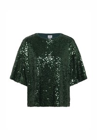 Haut vert à manches courtes orné de sequins, avec un col rond et une coupe ample. La surface du tissu reflète la lumière, créant un effet scintillant.
