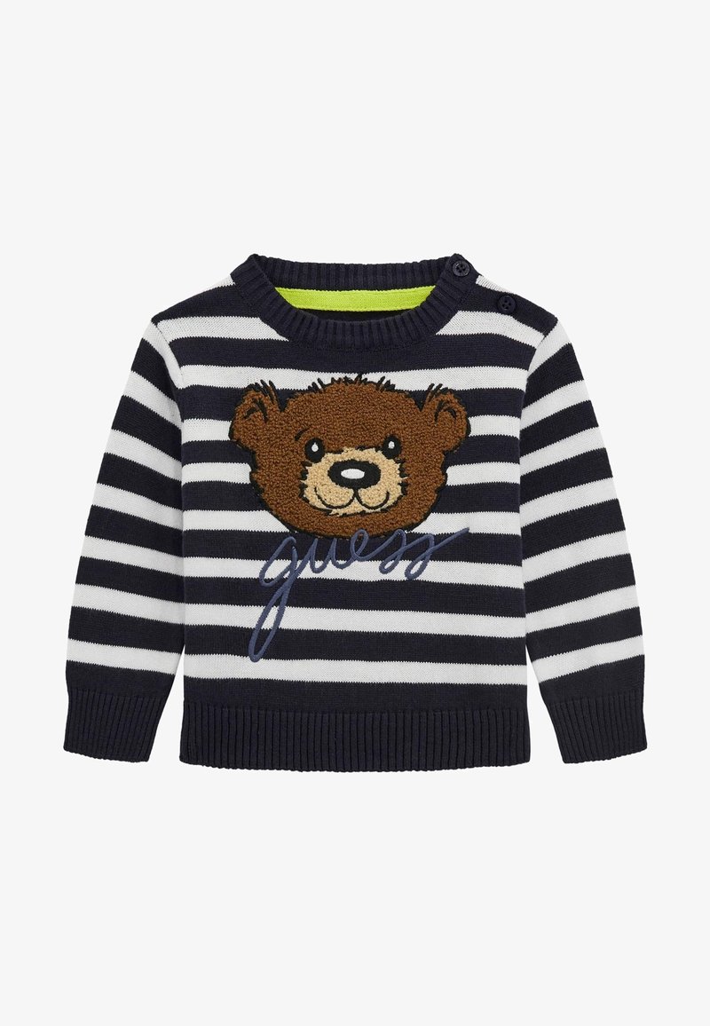 Pull à manches longues rayé bleu marine et blanc avec un visage d'ours brun texturé et le mot "guess" brodé sur le devant, avec des boutons sur l'épaule.