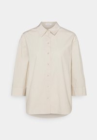 Beiges Hemd mit Kragen, dreiviertellangen Ärmeln, Knopfverschluss und lockerem Schnitt aus glattem Baumwollstoff.