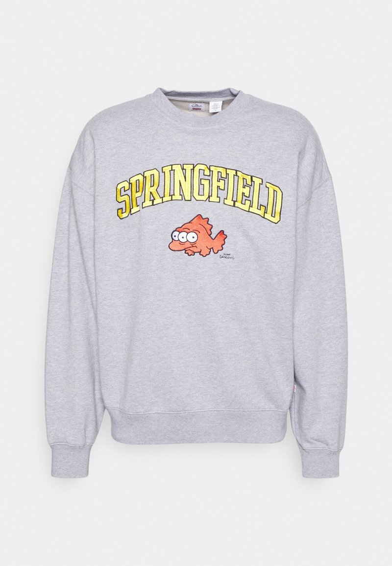 Sweat-shirt gris clair avec texte jaune "SPRINGFIELD" et un poisson dessin animé orange aux grands yeux en dessous du texte sur le devant.