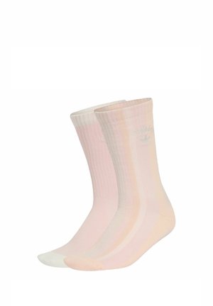 Due paia di calzini a costine a giro in tonalità pastello rosa e crema con un logo Adidas sottile sul lato.