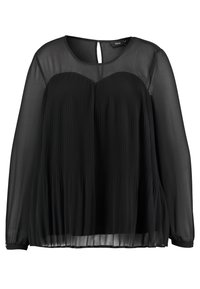 Blouse noire à manches longues avec manches transparentes et haut de poitrine transparent, corsage plissé, encolure ronde et fermeture par boutons au dos.