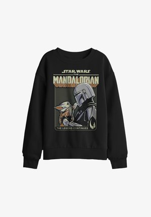 Black sweatshirt featuring Mandalorian holding Baby Yoda with caption "Star Wars The Mandalorian" and "The Legend Continues."