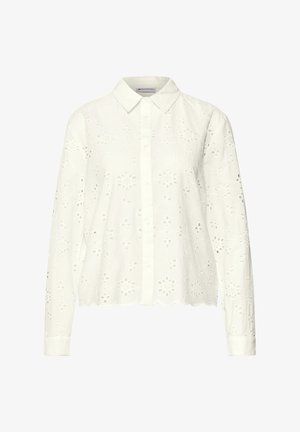 Weißes Bluse mit kragenförmigem Ausschnitt, langen Ärmeln, floralem Lochmuster, gewelltem Saum und Knopfleiste. Leichtes Baumwollgewebe.