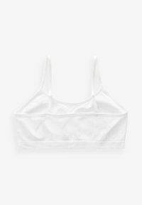 Witte crop top bralette van zacht, rekbaar materiaal met dunne verstelbare bandjes en een naadloos ontwerp. Geen versieringen of patronen.