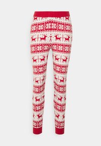 Red and white patterned leggings with a festive design featuring reindeer and snowflakes. Knitted fabric with a fitted silhouette and red waistband.