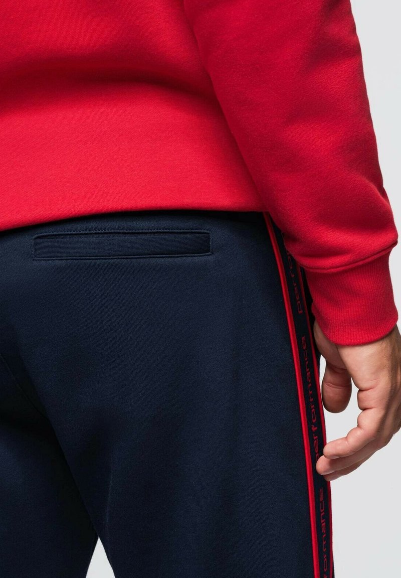 Ombre JOGGER WITH STRIPES - Tracksuit bottoms - navy blue/dark blue -  Zalando