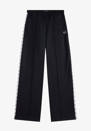Pantalon de survêtement noir à jambes larges avec des bandes blanches sur les côtés ornées de couronnes de laurier noires répétées et un logo de couronne de laurier brodé sur la cuisse.