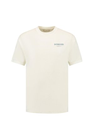 Cream-colored cotton t-shirt featuring a round neckline and short sleeves, with "DSTREZZED" printed in blue on the left chest.