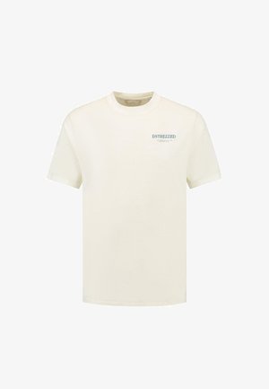 Helle Baumwoll-T-Shirt in Cremefarbe mit Rundhalsausschnitt und kurzen Ärmeln, versehen mit "DSTREZZED" in Blau auf der linken Brust.