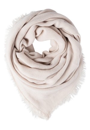 Light beige triangular scarf with fringed edges, loosely folded into a circular shape against a white background.