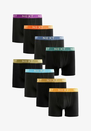 Boxer shorts noirs avec ceintures élastiques en violet, orange, bleu, vert et jaune, affichant le logo "NEXT" sur chaque ceinture.