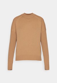 Pull beige à texture côtelée avec manches longues. Encolure ronde et coutures raglan pour une meilleure structure. Corps et ourlet lisses.