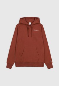 Hoodie marron avec une poche avant, capuche réglable avec cordon, et logo "Champion" blanc sur la poitrine gauche. Fabriqué en tissu doux.