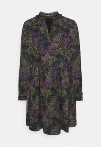 Långärmad klänning i genomskinlig svart tyg med ett blommönster i lila och grönt. Har en rund halsringning och en nyckelhålsöppning.