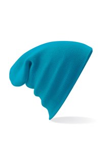 Turquoise knitted beanie with a ribbed texture, featuring a slouchy design and a curved top edge.