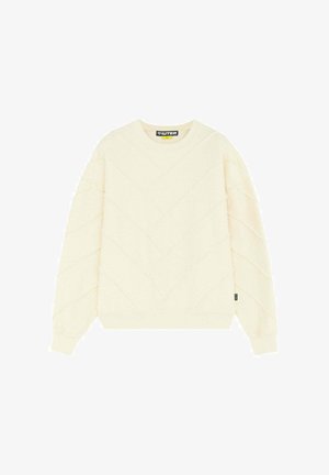 Maglione color avorio con scollo rotondo, motivo a chevron trapuntato, maniche lunghe, polsini a costine e piccolo etichetta laterale nera.