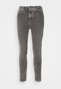 Tajta jeans i blekt svart denim, med hög midja, klassisk femficksdesign och subtil blekning genom hela tyget.