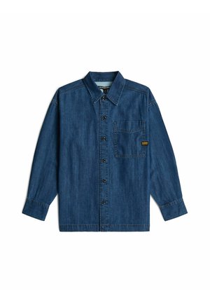 Langärmliges dunkelblaues Denimhemd mit Kragen, vorderen Knöpfen und einer einzelnen Brusttasche mit kleinem gelbem Etikett.