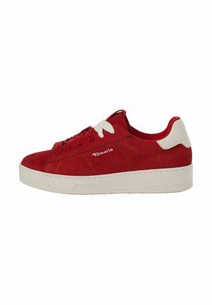 Red suede sneaker with white accents, round toe, flat sole, and textured detailing on the sides. Features flat laces and logo.
