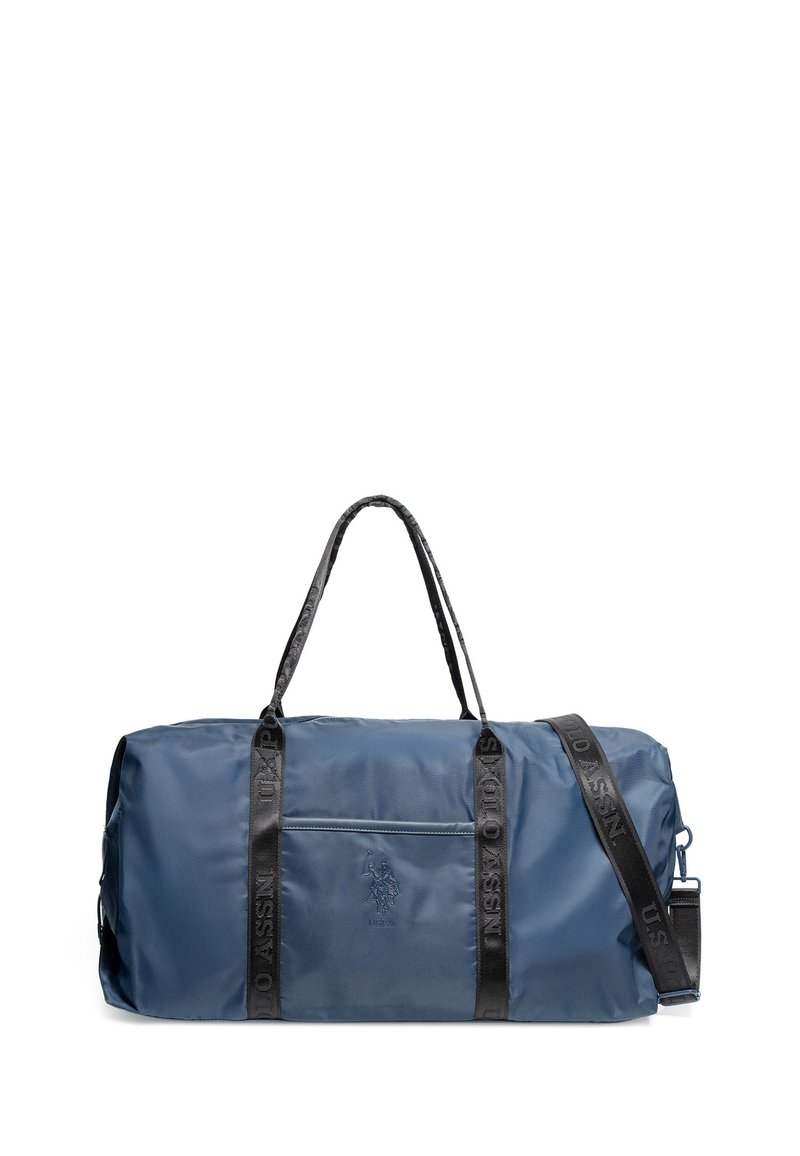 Navy nylon duffel bag with black woven handles, adjustable strap, front zip pocket, and embossed logo detail. Smooth texture.