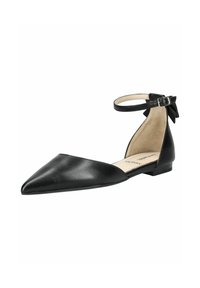 Chaussure plate noire à bout pointu avec sangle à la cheville et un petit nœud à l'arrière, présentant une finition en cuir lisse et une doublure intérieure beige.