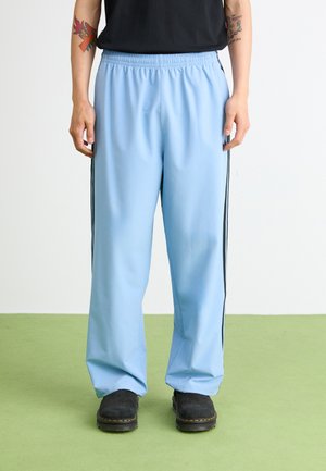 DRILL - Tracksuit bottoms - ash blue/black