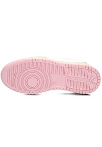 Sneaker sole with a textured pink rubber outsole. Features circular and linear patterns, with a round emblem at the center.